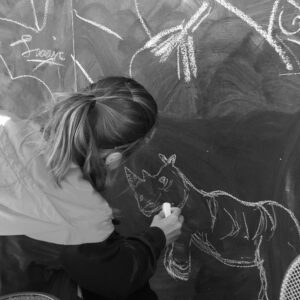nicole rhino at chalkboard